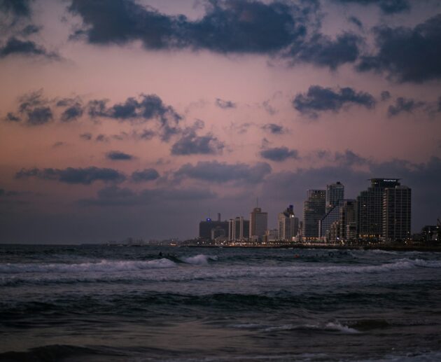 a view of a city from the ocean