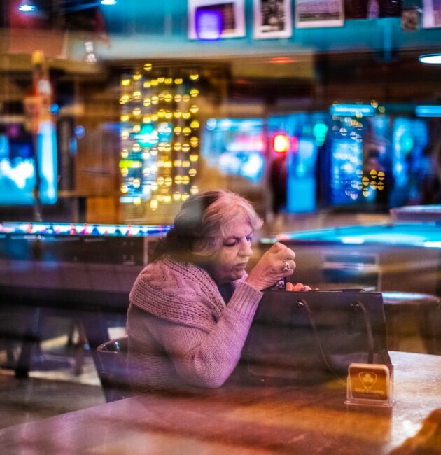 woman sitting at the table inside room